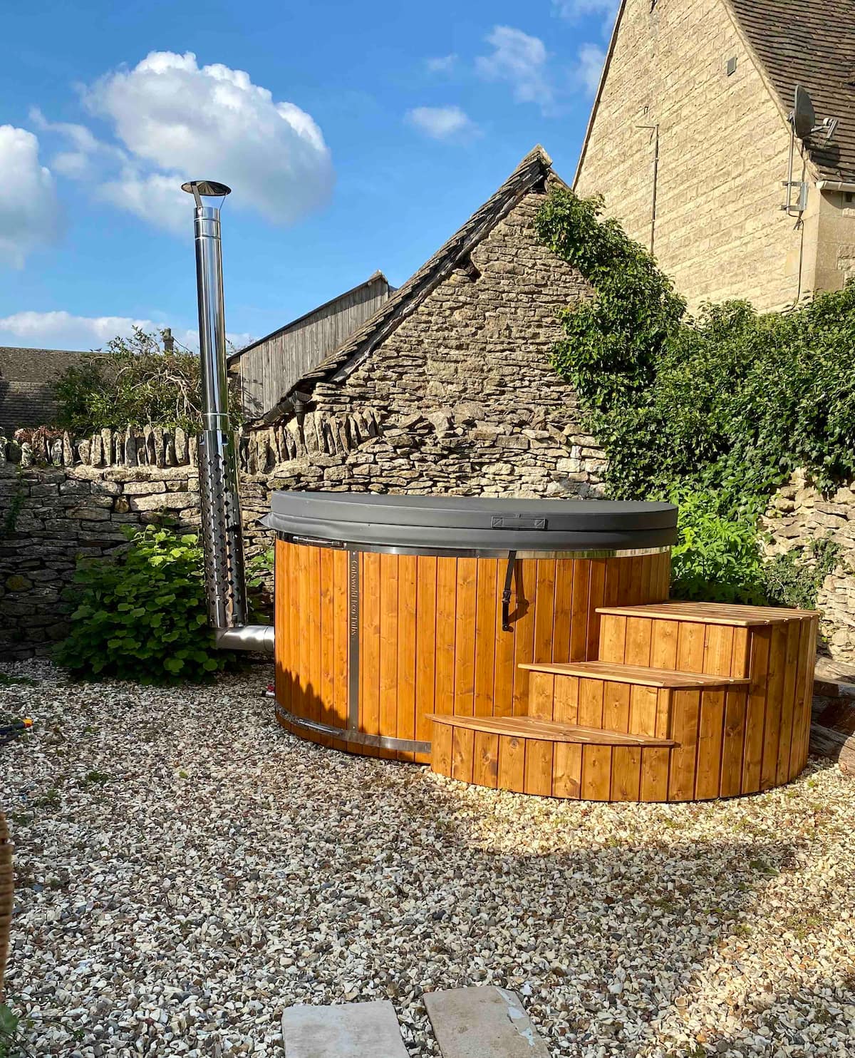 Wood-fired hot tub in the enclosed garden